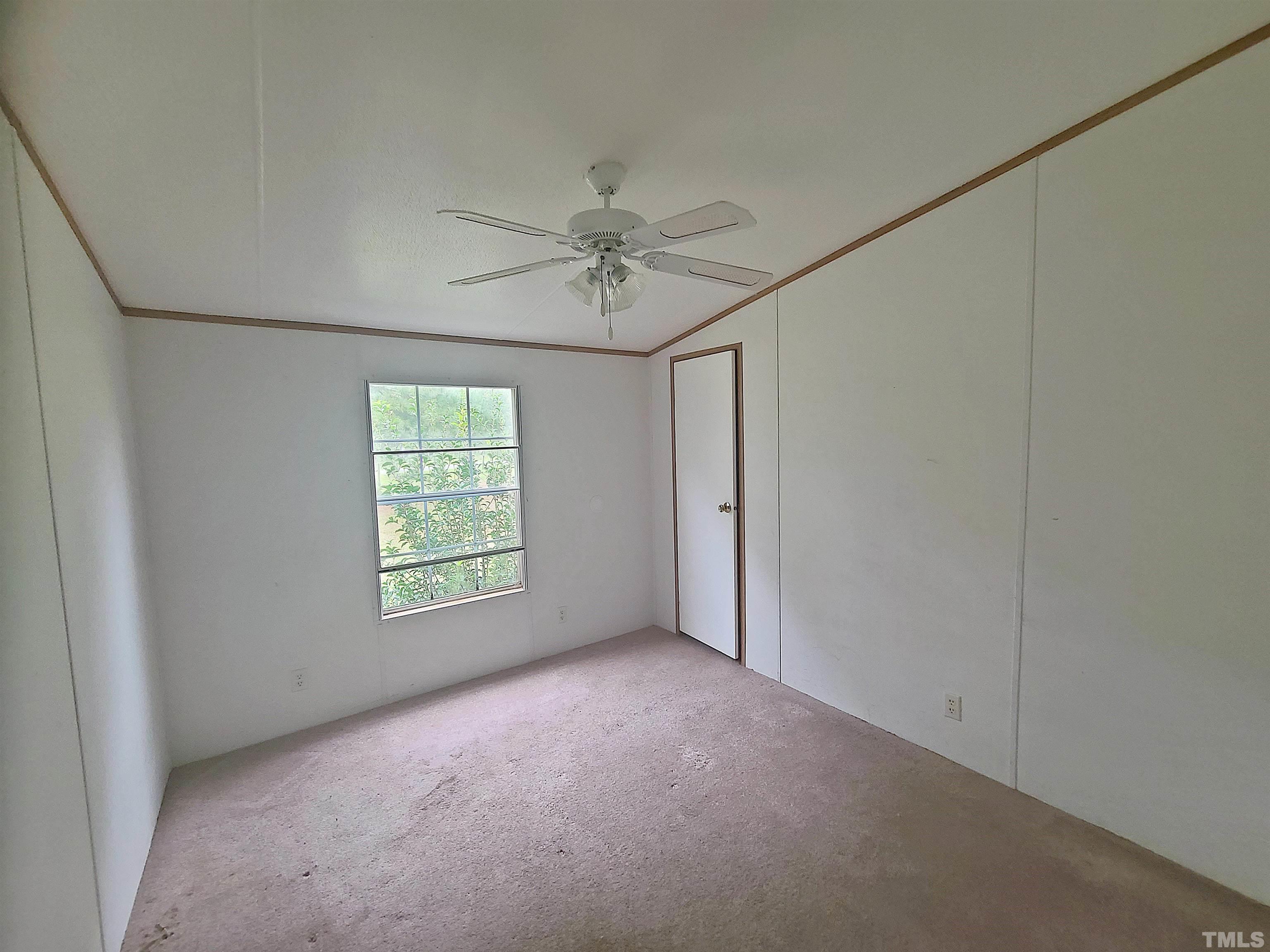 95 Moore Perkerson Road Spring Hope, NC 27882 - Photo 30 of 31 a view of an empty room with a window