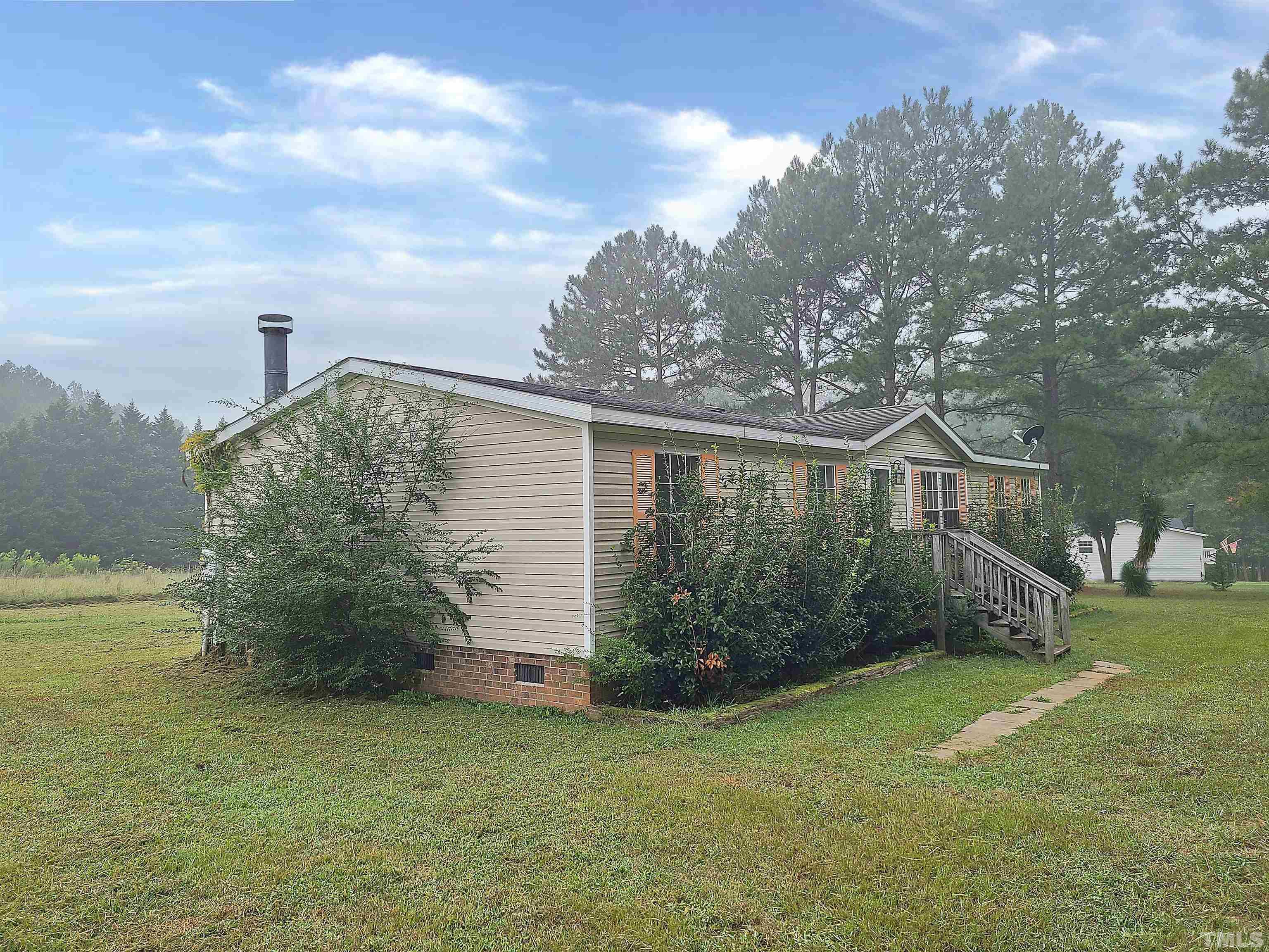 95 Moore Perkerson Road Spring Hope, NC 27882 - Photo 5 of 31 a view of a backyard