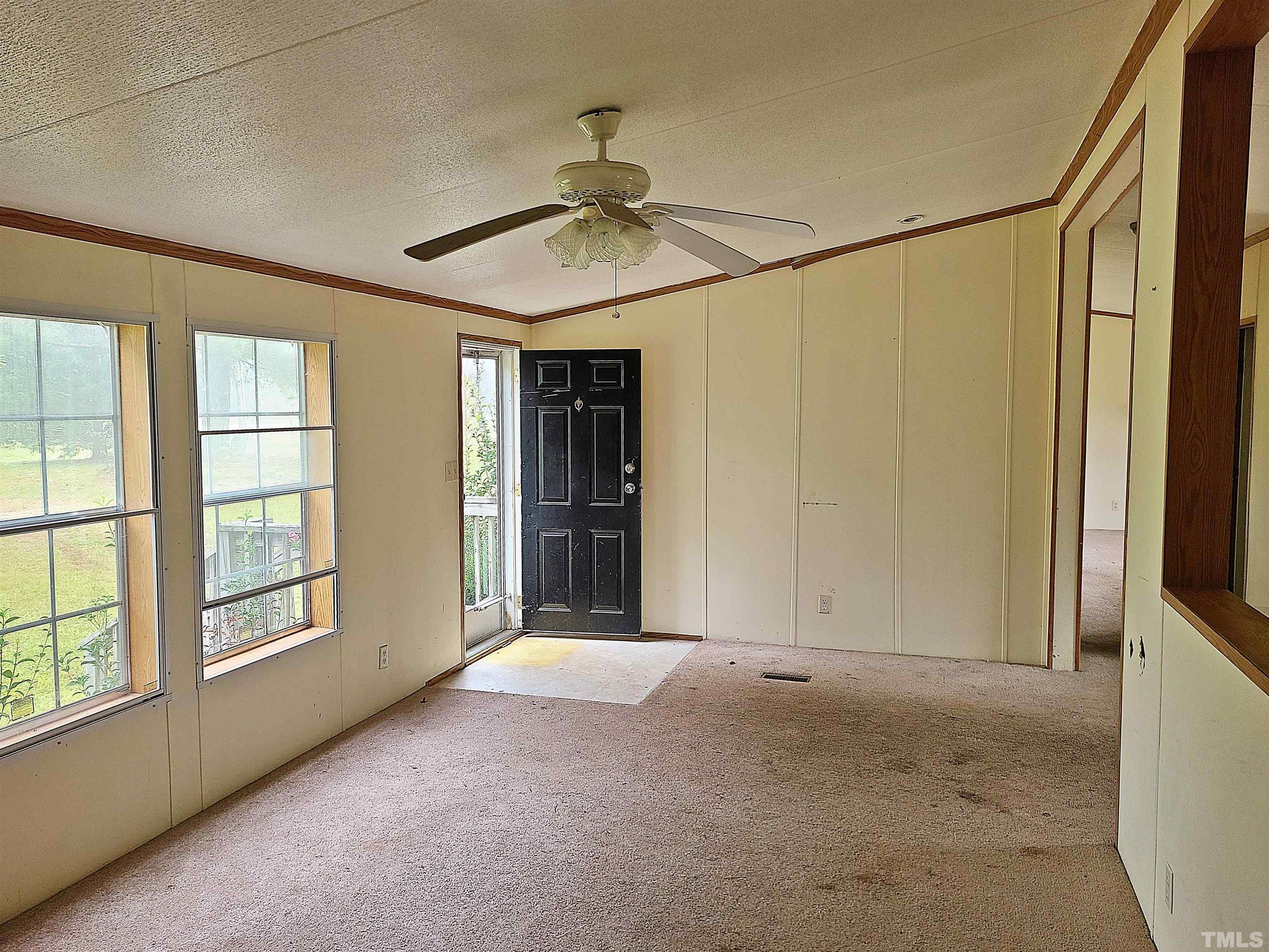 95 Moore Perkerson Road Spring Hope, NC 27882 - Photo 9 of 31 a view of an empty room with a window