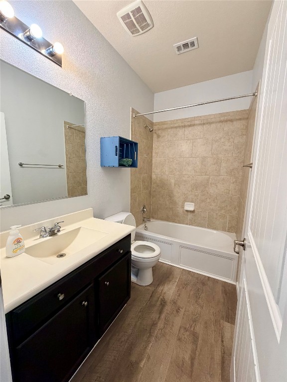 10204 Pinnacle Crest Loop Austin, TX 78747 - Photo 15 of 19 a bathroom with a double vanity sink and mirror with shower