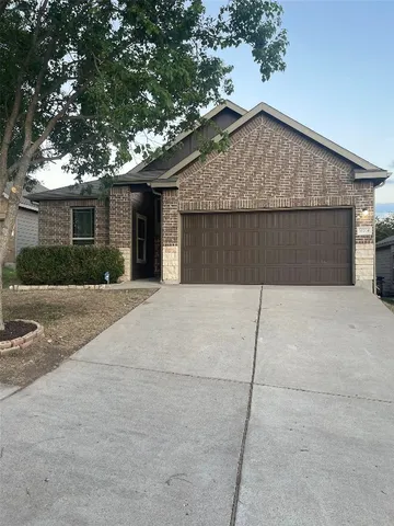 front view of a house with a street