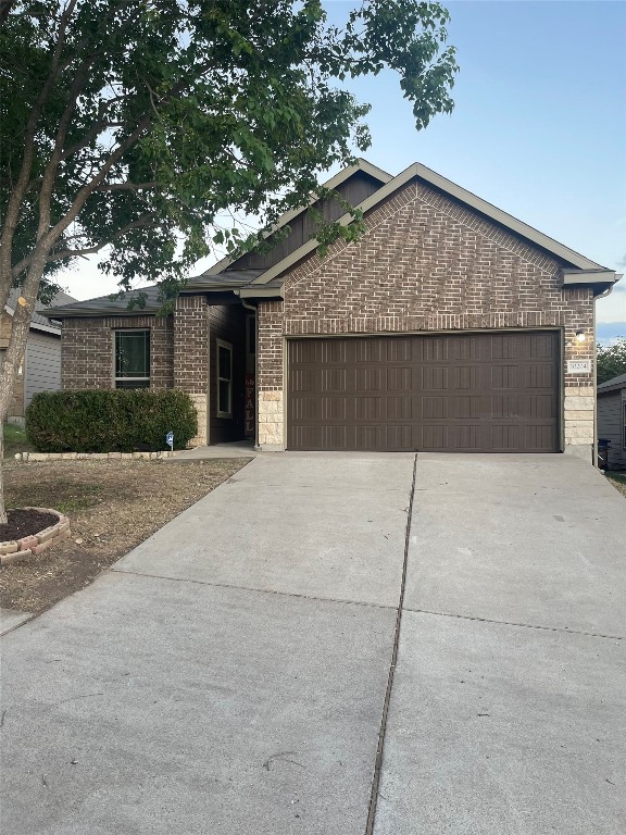 10204 Pinnacle Crest Loop Austin, TX 78747 - Photo 3 of 19 front view of a house with a street