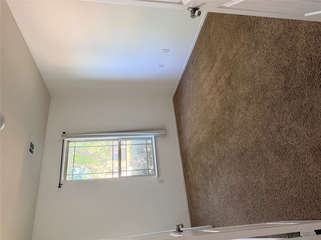 10204 Pinnacle Crest Loop Austin, TX 78747 - Photo 7 of 19 an empty room with a window