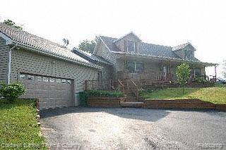 8561 Pettysville Road Pinckney, MI 48169 - Photo 1 of 1 Front View