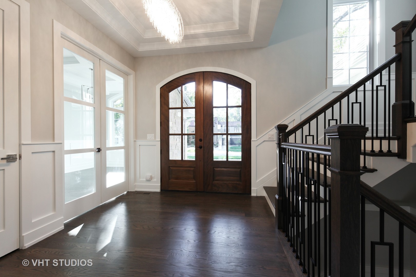 719 Juniper Road Glenview, IL 60025 - Photo 2 of 39 an empty room with wooden floor and windows