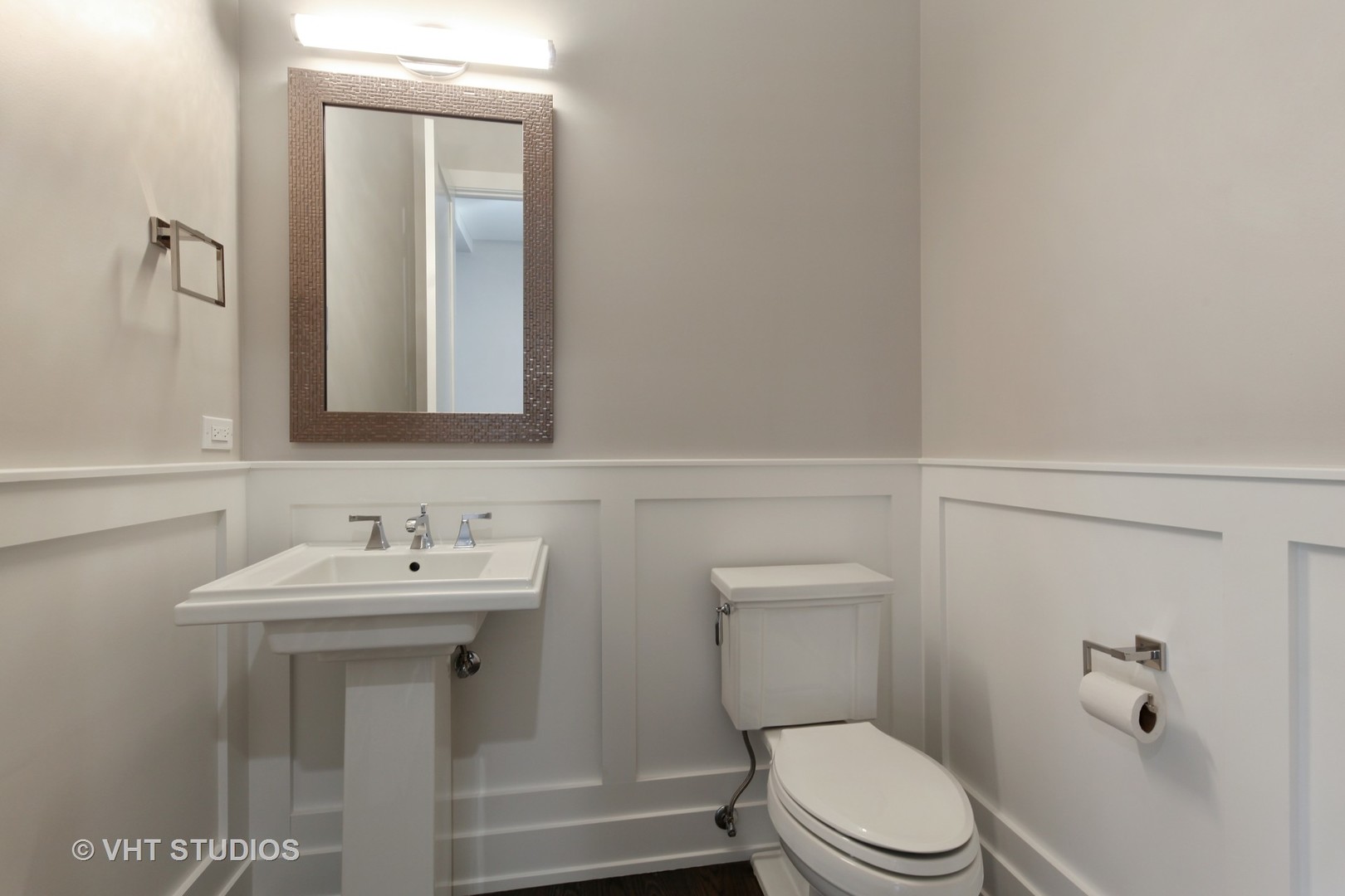 719 Juniper Road Glenview, IL 60025 - Photo 14 of 39 a bathroom with a toilet a sink and mirror