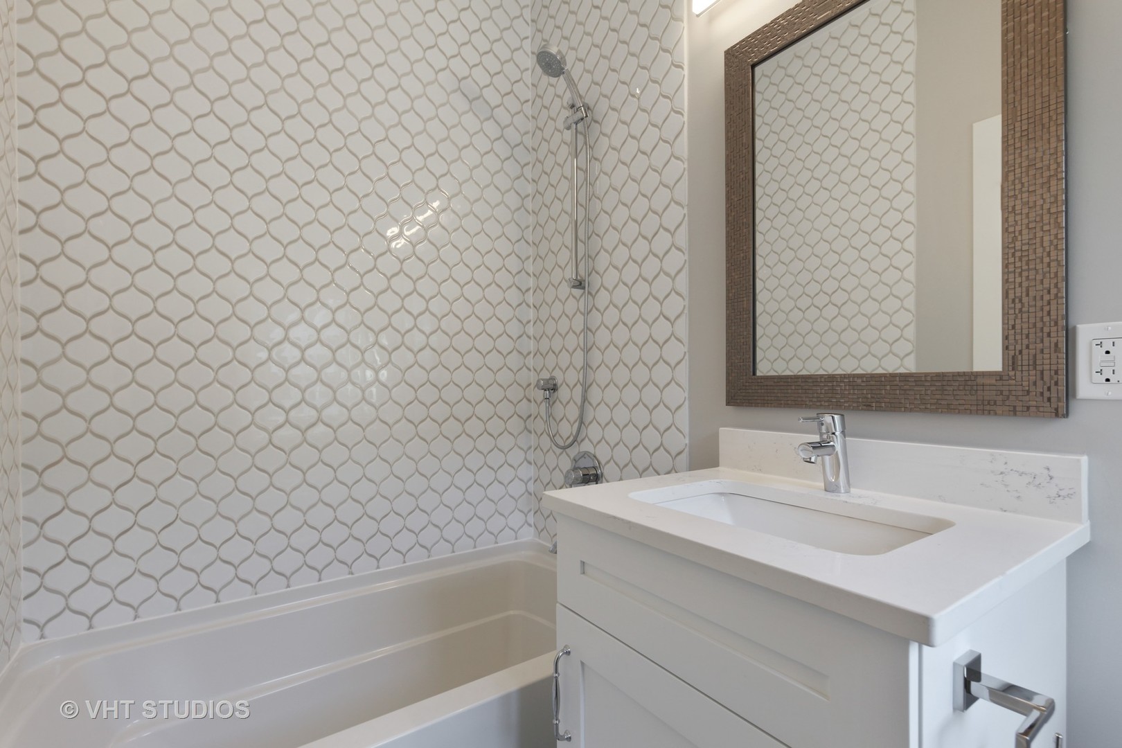 719 Juniper Road Glenview, IL 60025 - Photo 21 of 39 a bathroom with a sink and a bathtub