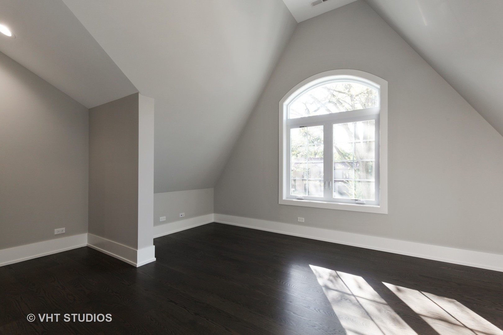 719 Juniper Road Glenview, IL 60025 - Photo 22 of 39 an empty room with wooden floor and windows