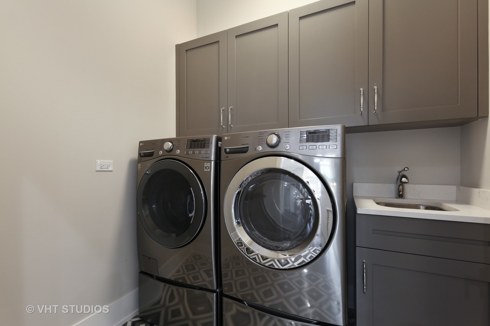 719 Juniper Road Glenview, IL 60025 - Photo 27 of 39 a utility room with sink dryer and washer