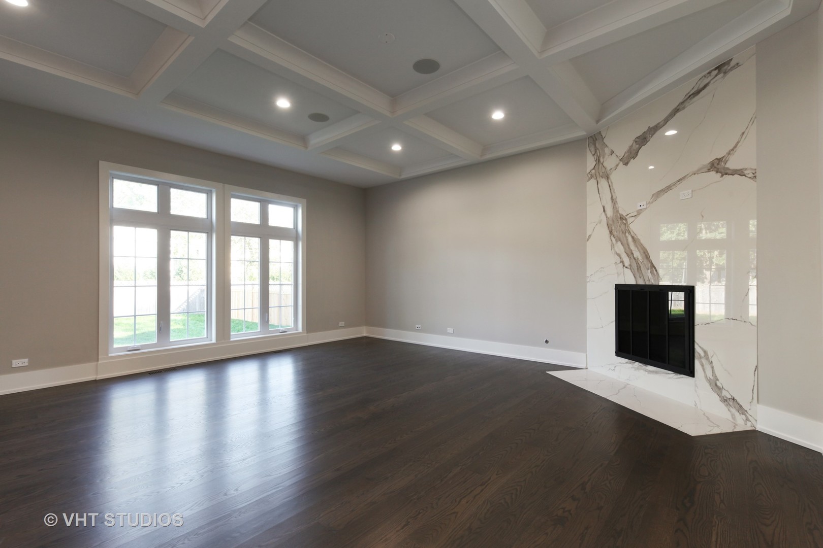 719 Juniper Road Glenview, IL 60025 - Photo 4 of 39 a view of an empty room with wooden floor and a window