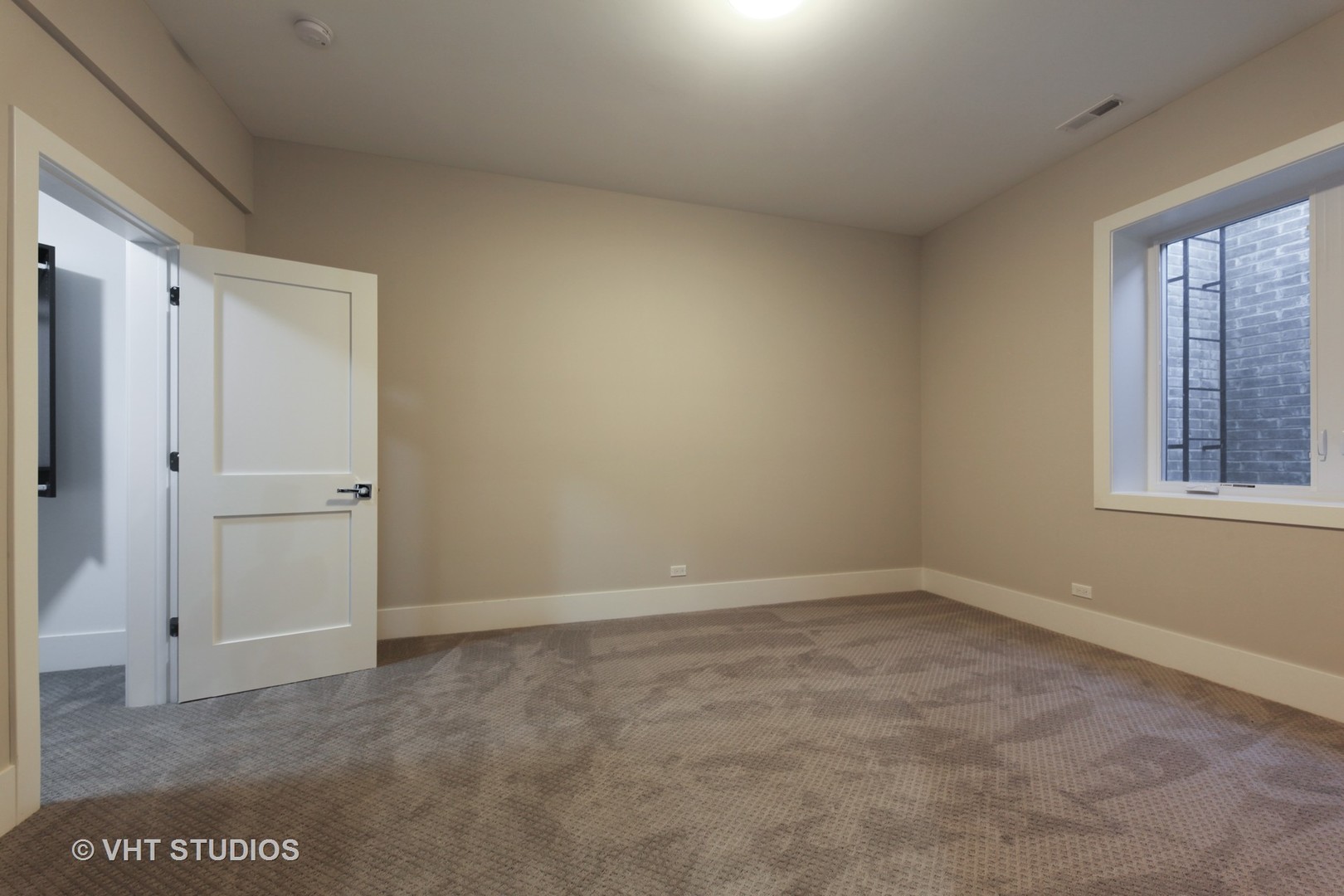 719 Juniper Road Glenview, IL 60025 - Photo 32 of 39 a view of an empty room with a window