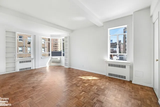 a view of an empty room and window