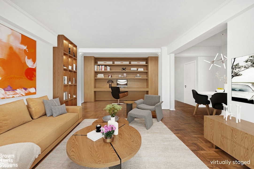20 East 74th Street, Unit 8A Manhattan, NY 10021 - Photo 3 of 22 a living room with furniture and a large window