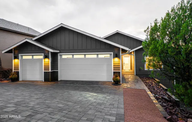 a view of a house with wooden walls