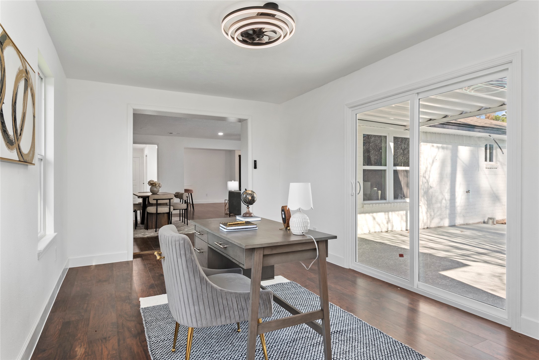6126 Knotty Post Lane Spring, TX 77373 - Photo 13 of 18 a view of a dining room with furniture window and wooden floor