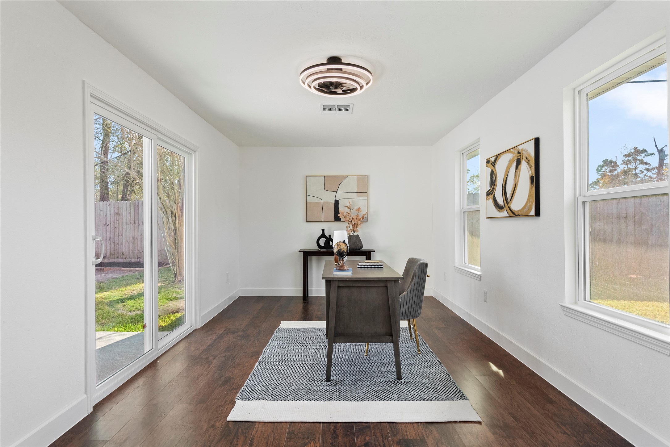 6126 Knotty Post Lane Spring, TX 77373 - Photo 14 of 18 a workspace with wooden floor