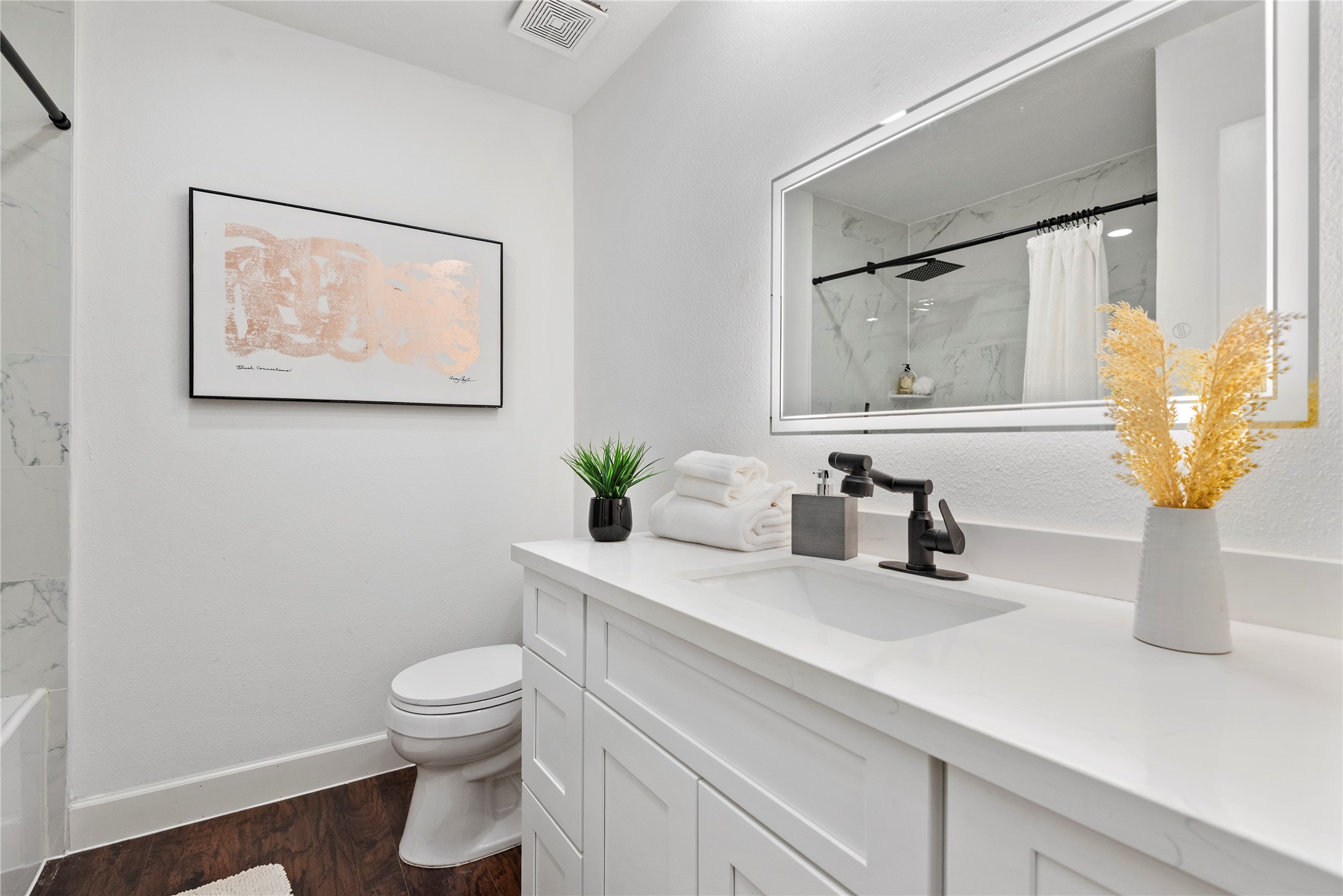 6126 Knotty Post Lane Spring, TX 77373 - Photo 15 of 18 a bathroom with a sink a toilet and mirror