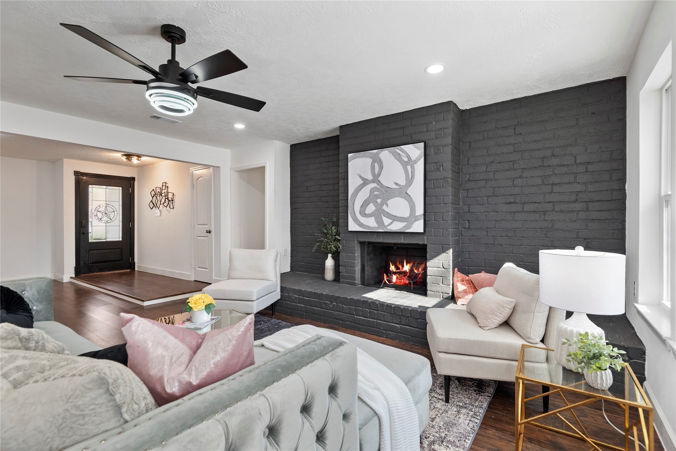 6126 Knotty Post Lane Spring, TX 77373 - Photo 18 of 18 a living room with furniture and a fireplace