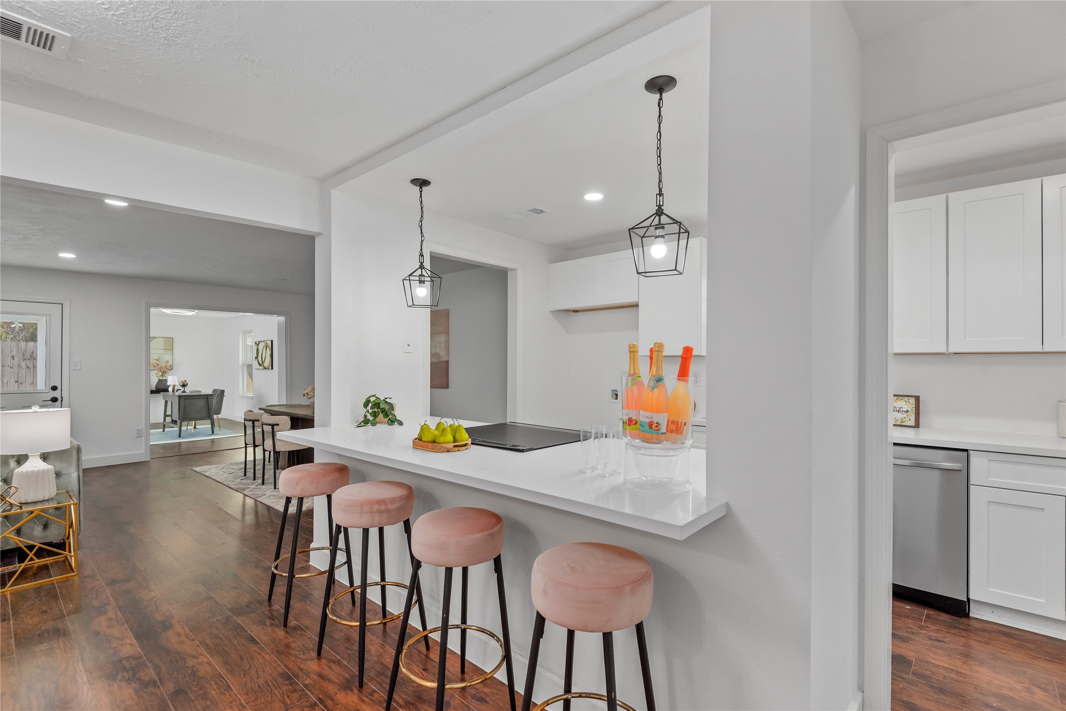 6126 Knotty Post Lane Spring, TX 77373 - Photo 3 of 18 a view of a dining room with furniture and wooden floor