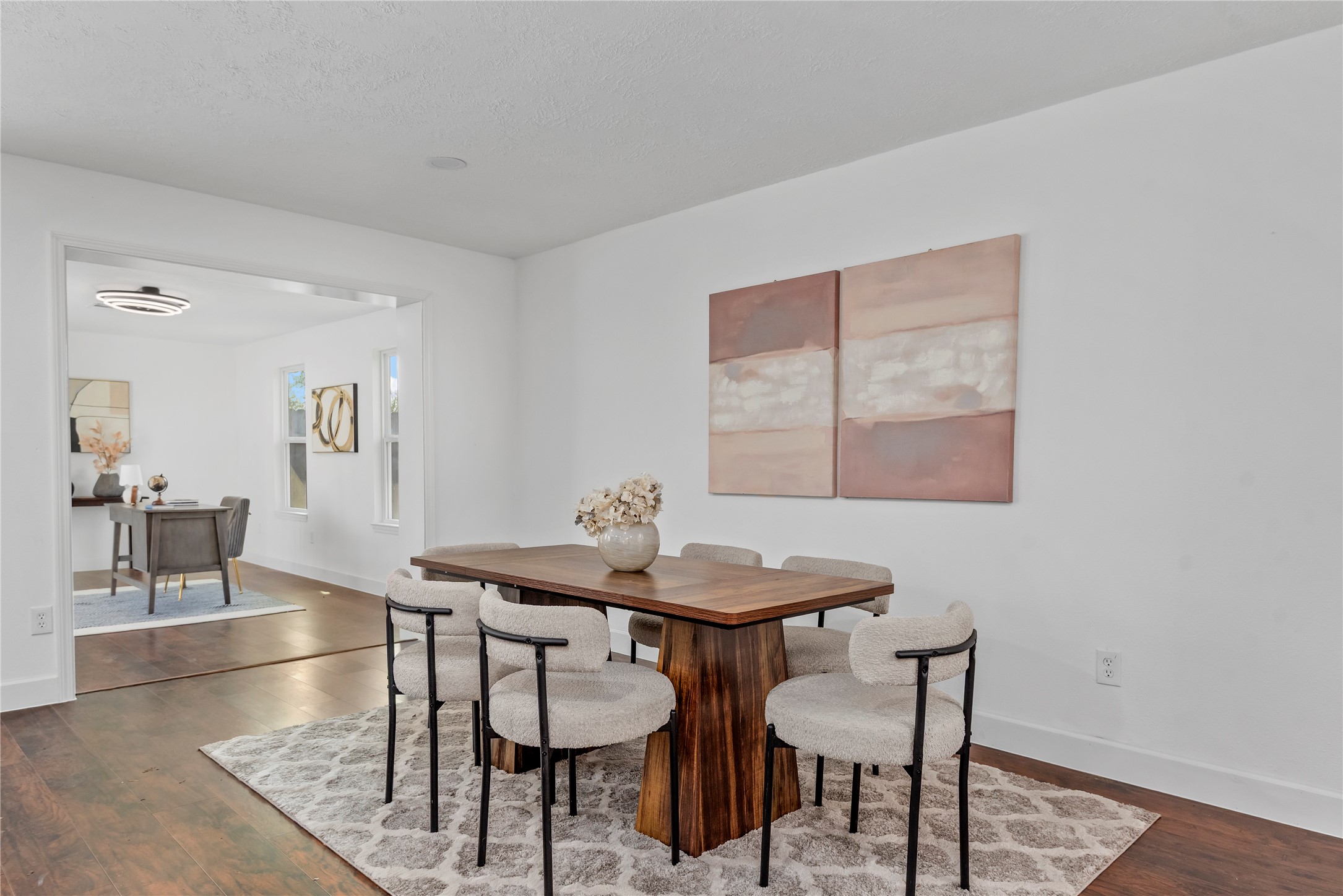 6126 Knotty Post Lane Spring, TX 77373 - Photo 8 of 18 a view of a dining room with furniture and wooden floor