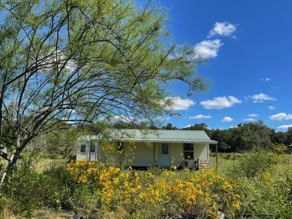 a front view of house with yard