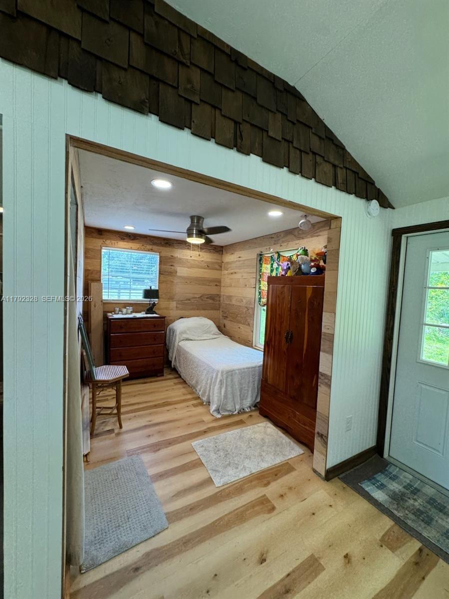 3725 Southwest 162nd Street Archer, FL 32618 - Photo 24 of 48 a view of a room with wooden floor and windows