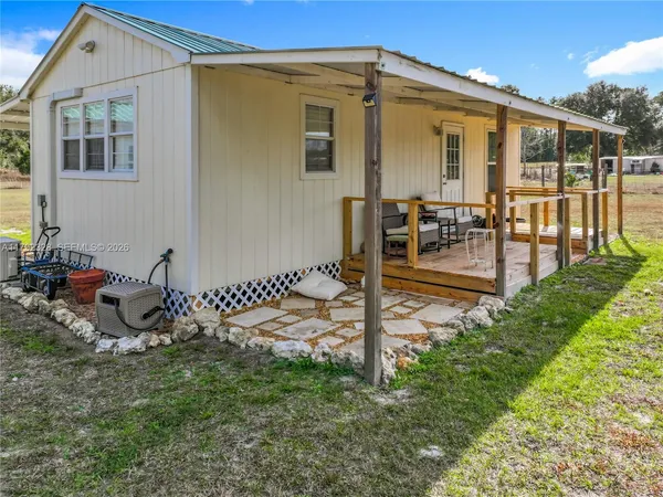 a view of a back yard of the house
