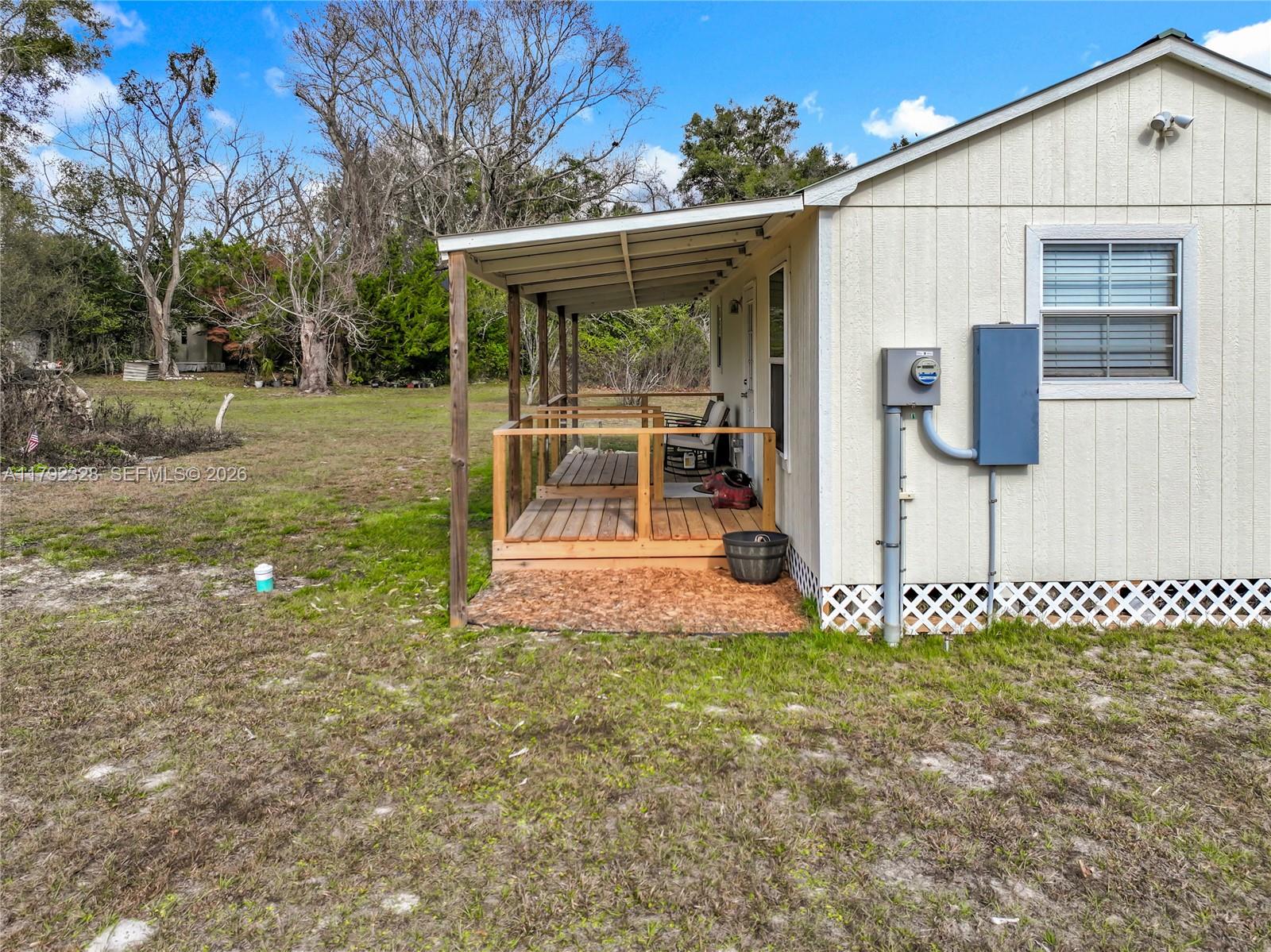 3725 Southwest 162nd Street Archer, FL 32618 - Photo 40 of 48 a view of a back yard of the house