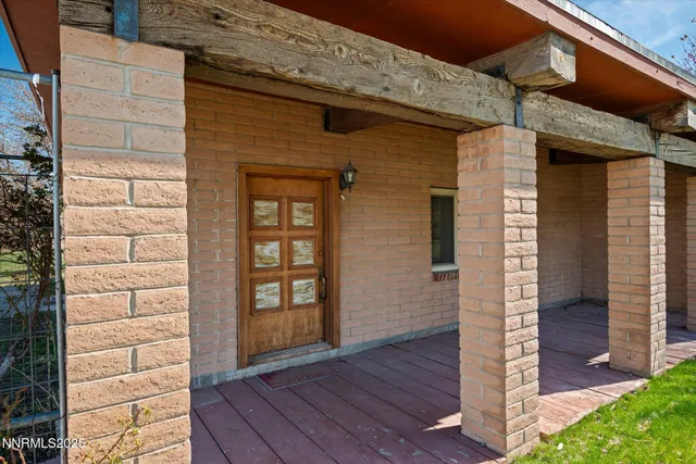 a front view of a house with a porch