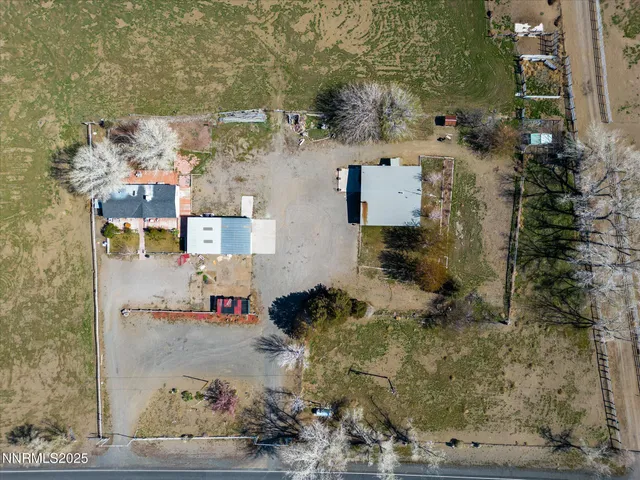 an aerial view of residential house with outdoor space