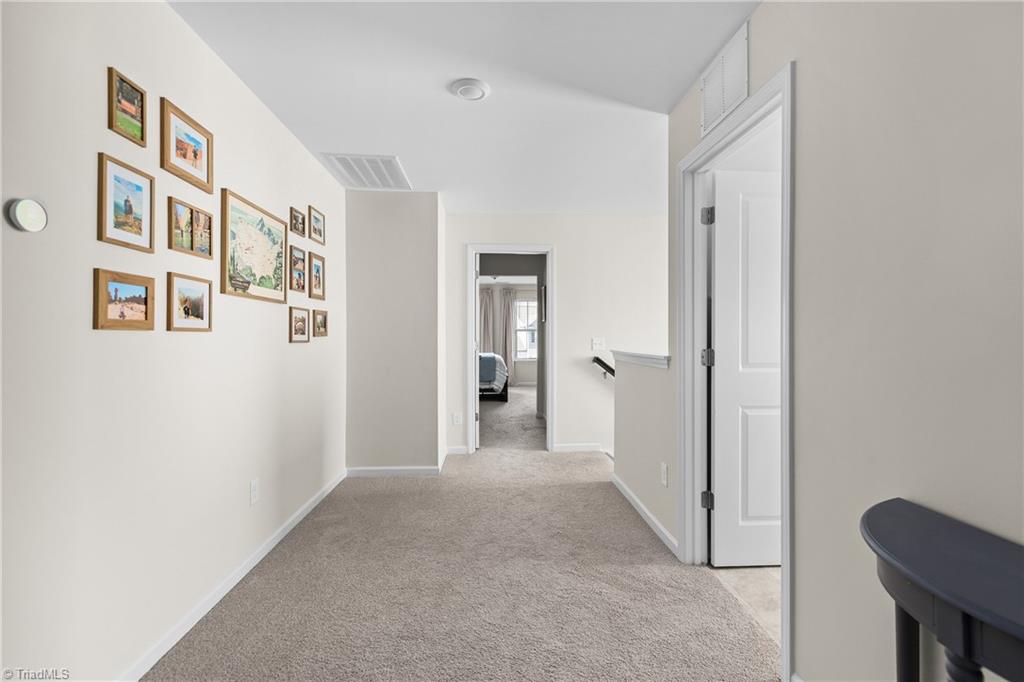 4020 Centerpiece Court High Point, NC 27265 - Photo 17 of 33 2nd Floor Hallway