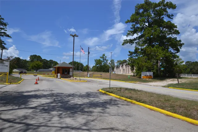 a view of a backyard with swimming pool