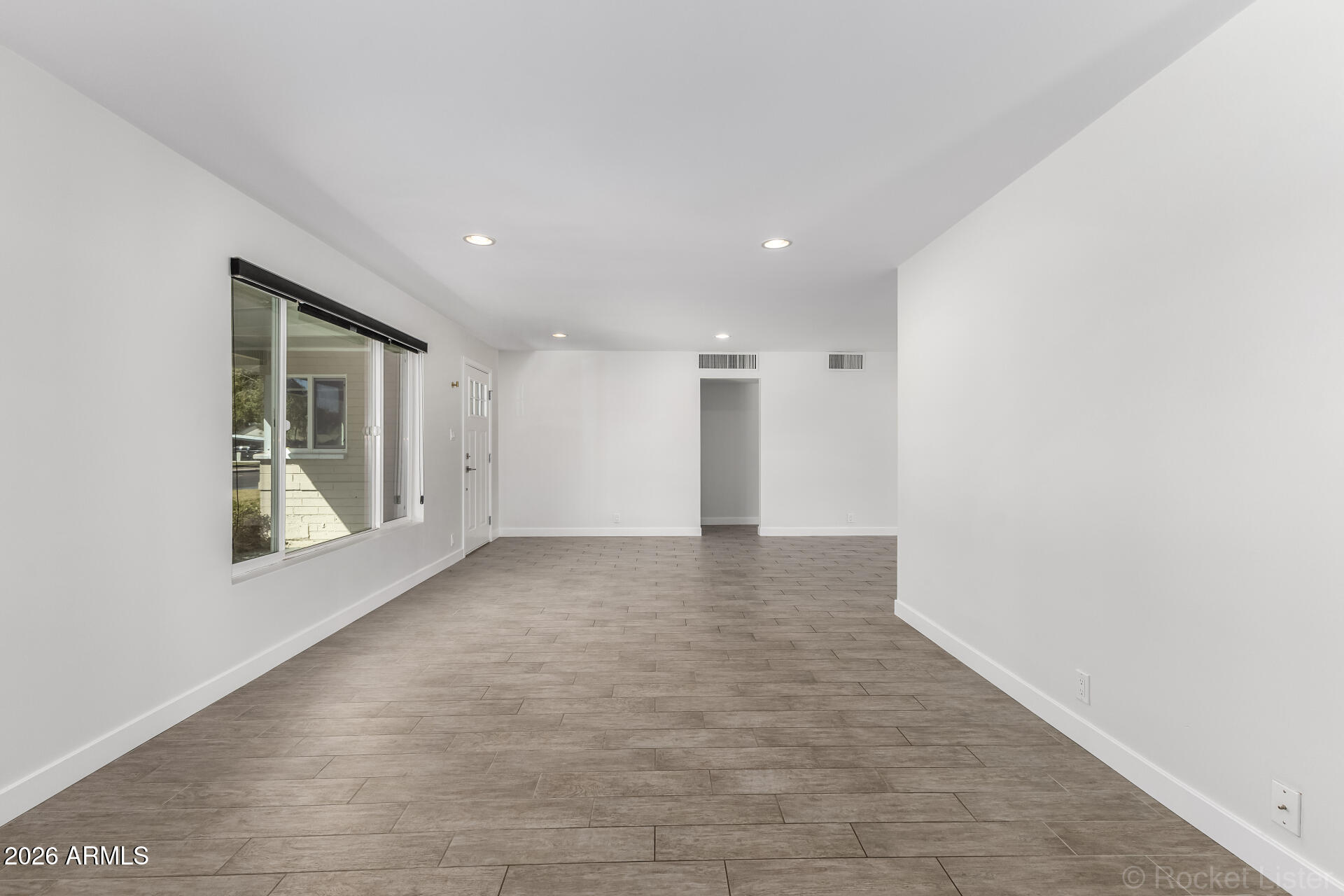 3930 East Oak Street Phoenix, AZ 85008 - Photo 25 of 61 14 - Oak Great Room Dining toward Entry