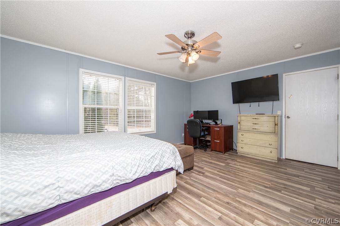 38 Bonbrook Creek Road Cumberland, VA 23040 - Photo 11 of 25 The primary bedroom is spacious and charming.