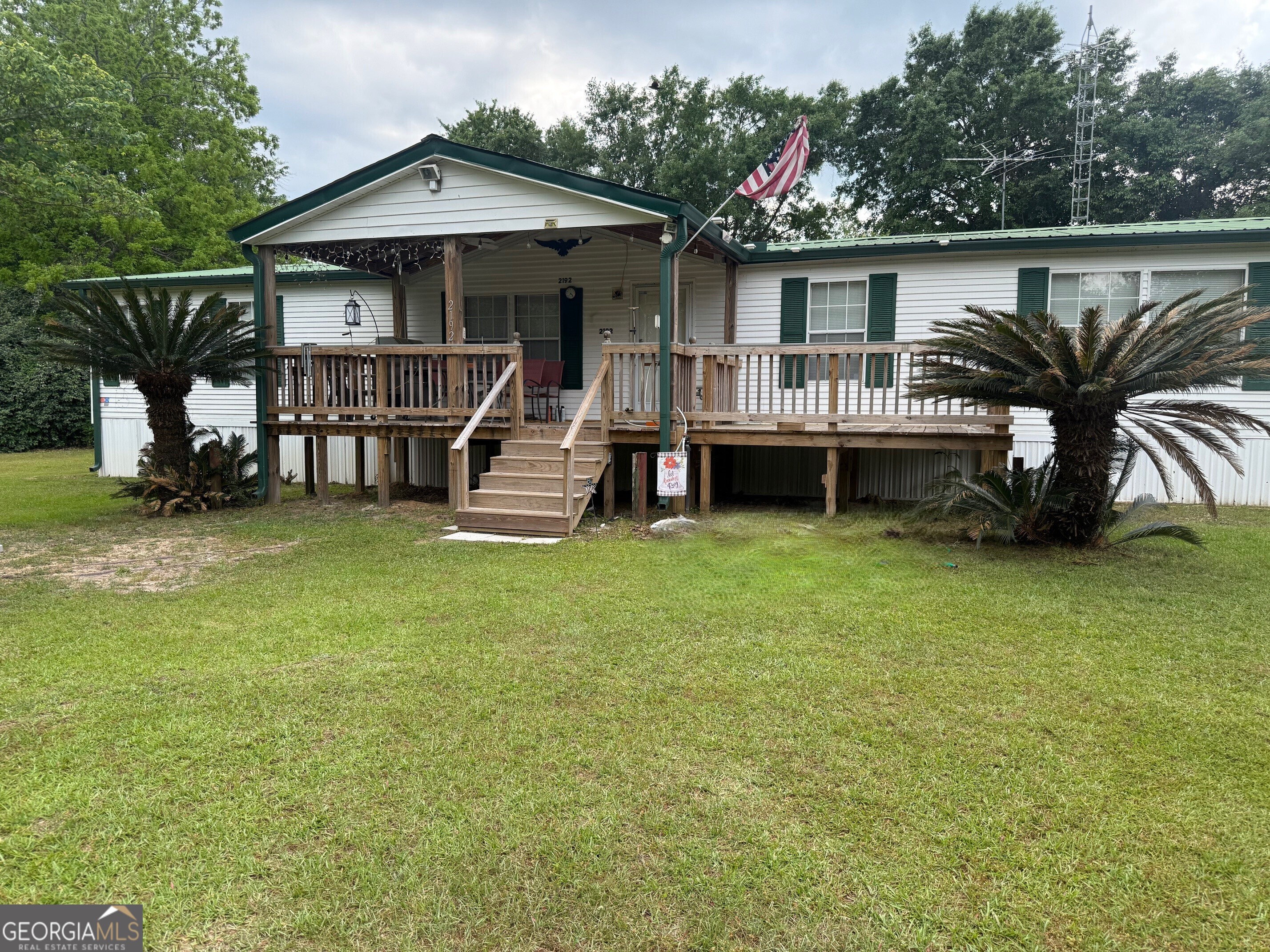 2192 Calhoun Drive Abbeville, AL 36310 - Photo 1 of 1 a view of a house with a balcony and sitting area