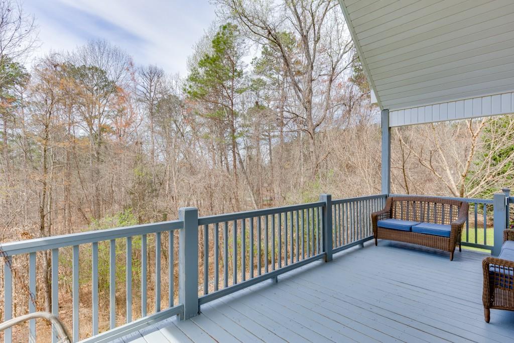 5050 Cagle Mill Road Lula, GA 30554 - Photo 37 of 48 a view of balcony with wooden floor and fence