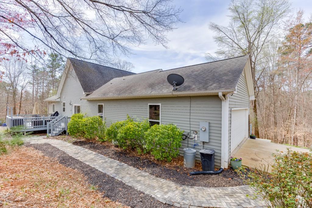 5050 Cagle Mill Road Lula, GA 30554 - Photo 39 of 48 a front view of a house with garden