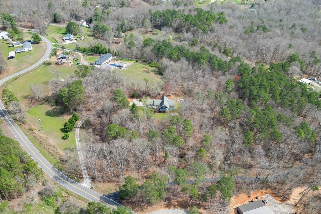 5050 Cagle Mill Road Lula, GA 30554 - Photo 45 of 48 an aerial view of residential house with outdoor space