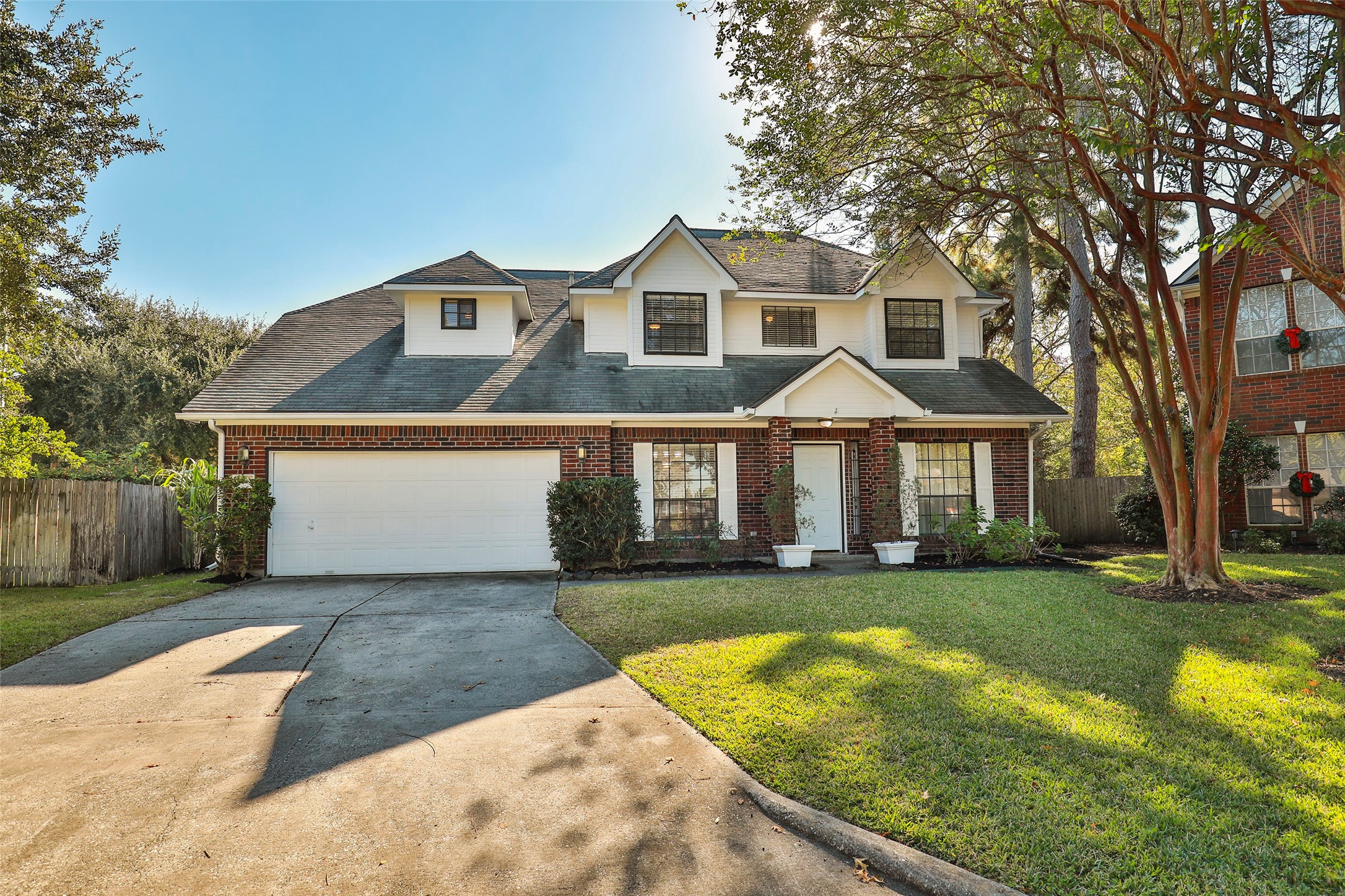 13110 Mills River Street Houston, TX 77070 - Photo 2 of 39 a view of a yard in front of house