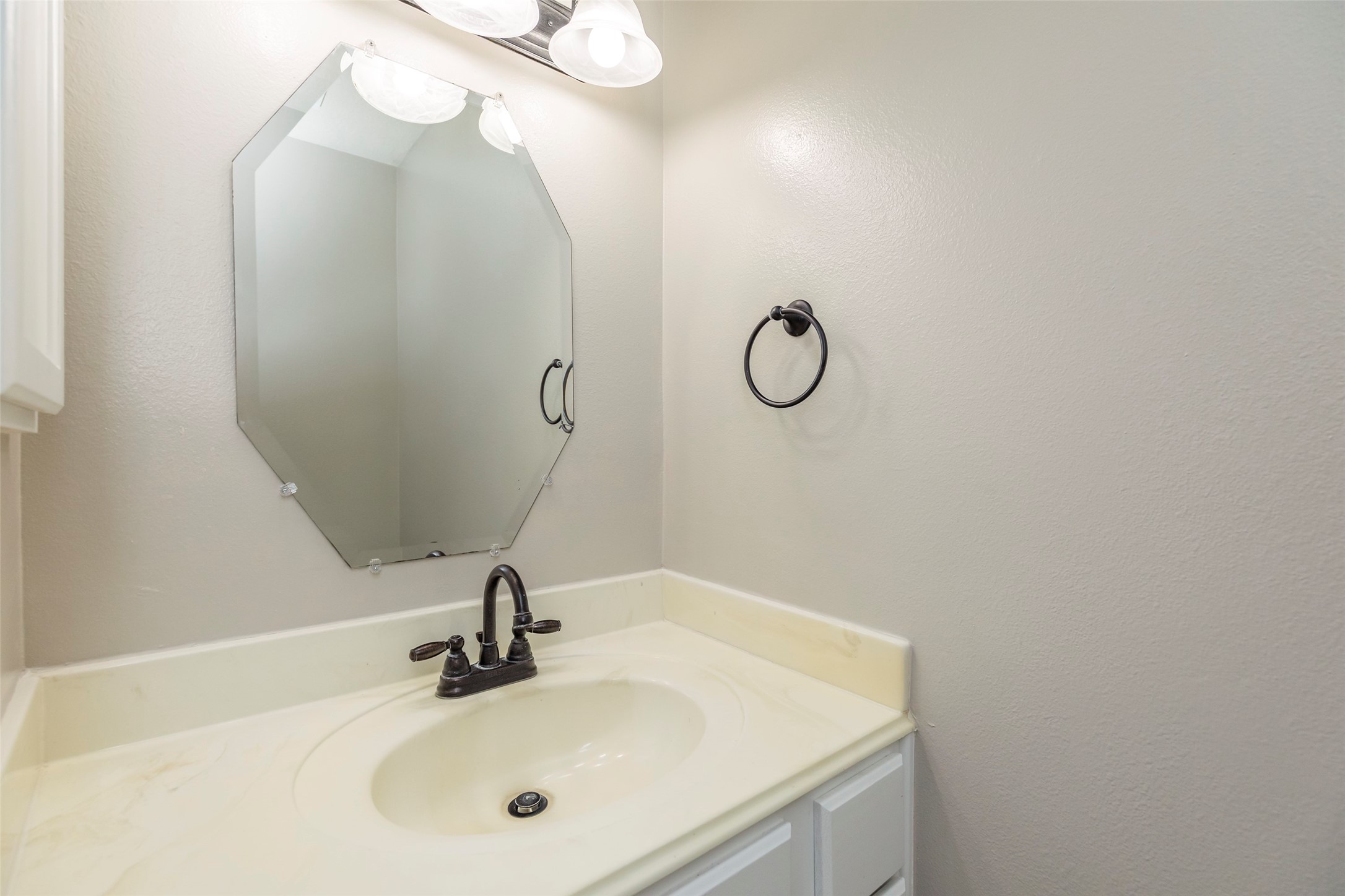 13110 Mills River Street Houston, TX 77070 - Photo 21 of 39 a bathroom with a sink and mirror