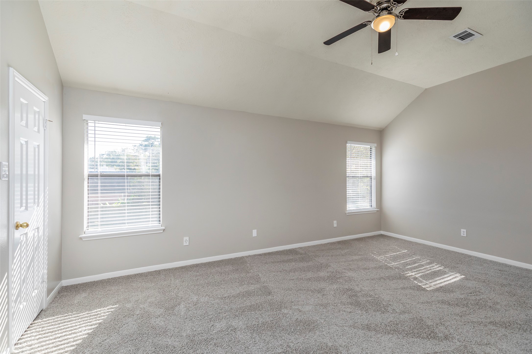 13110 Mills River Street Houston, TX 77070 - Photo 24 of 39 a view of an empty room with a window
