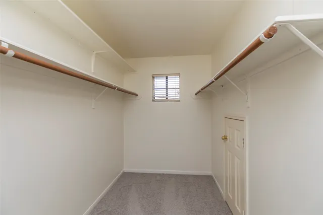a view of a bathroom with a window