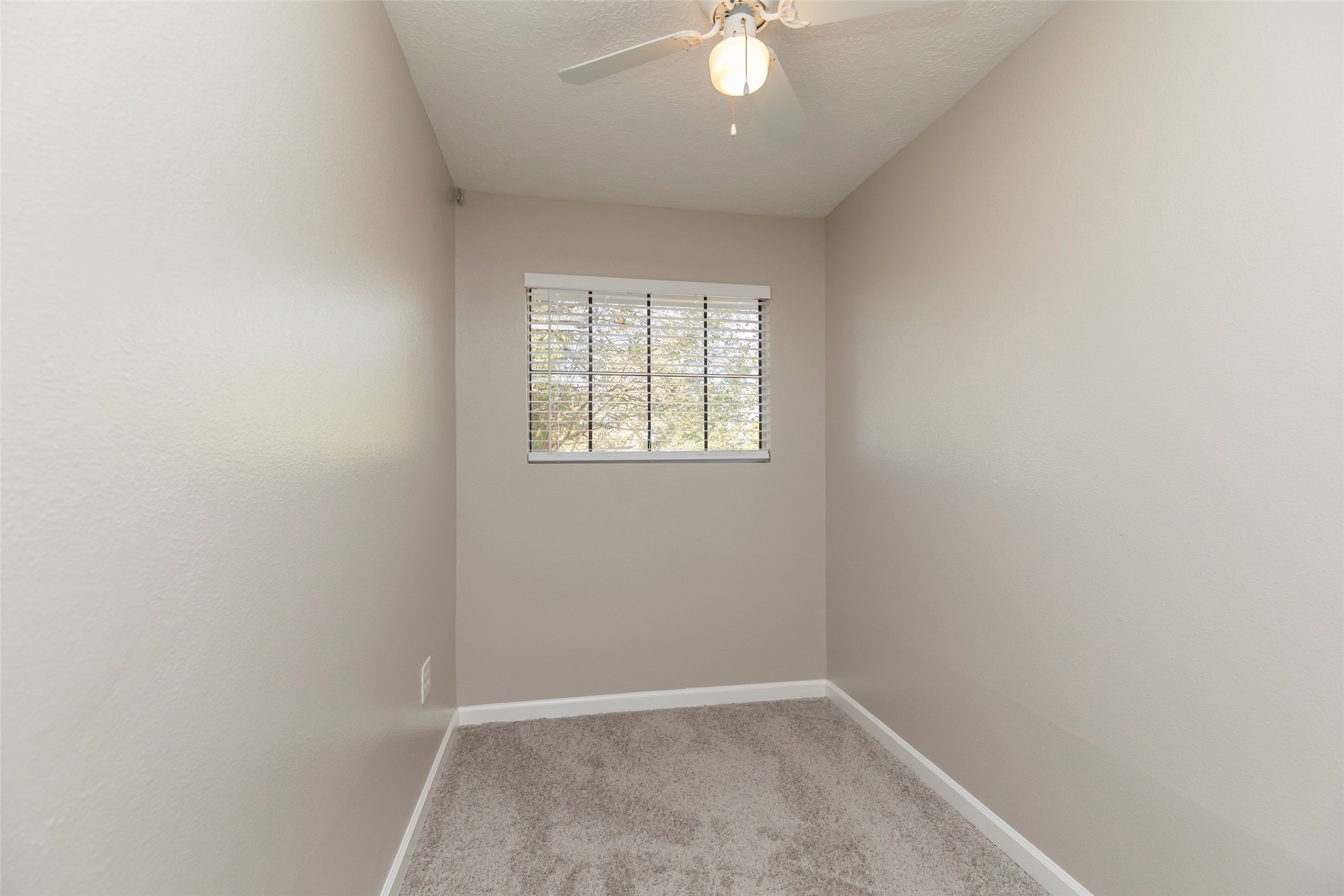 13110 Mills River Street Houston, TX 77070 - Photo 34 of 39 an empty room with a window