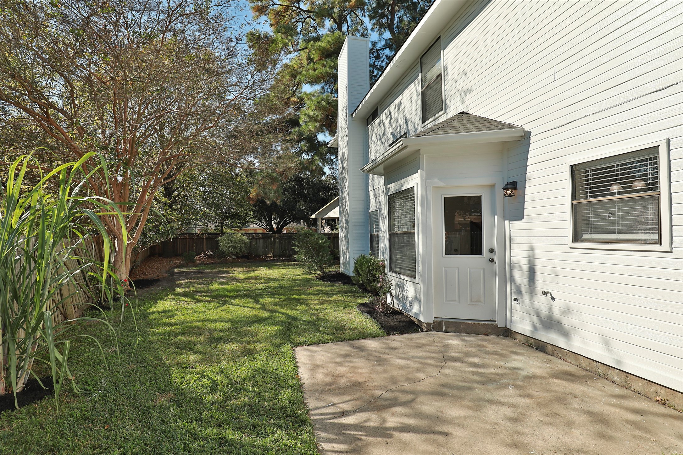 13110 Mills River Street Houston, TX 77070 - Photo 36 of 39 a view of a white house with a yard