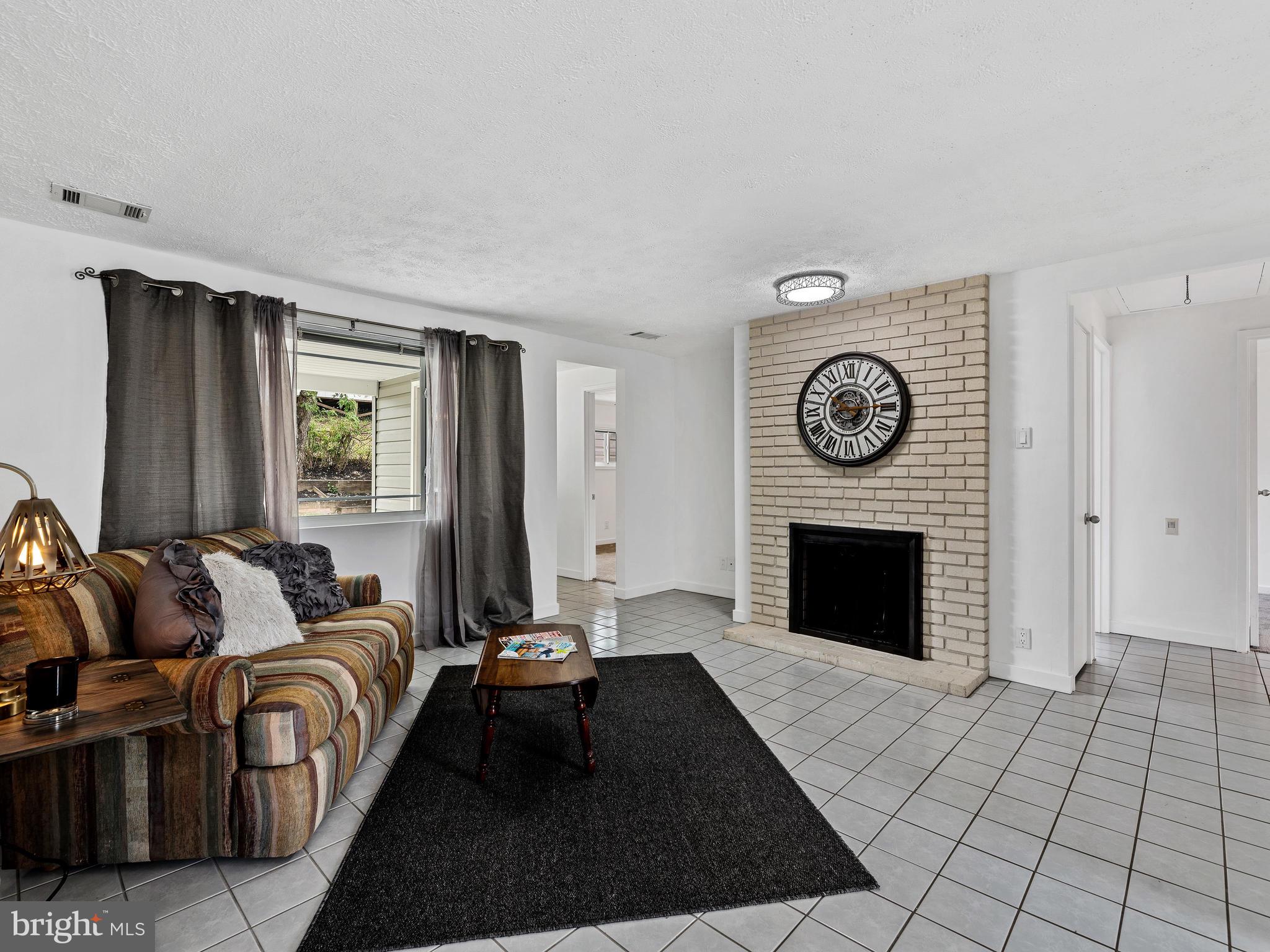 2409 Alma Road Baltimore, MD 21227 - Photo 28 of 28 Bright and open floor plan, ceramic tile floor!