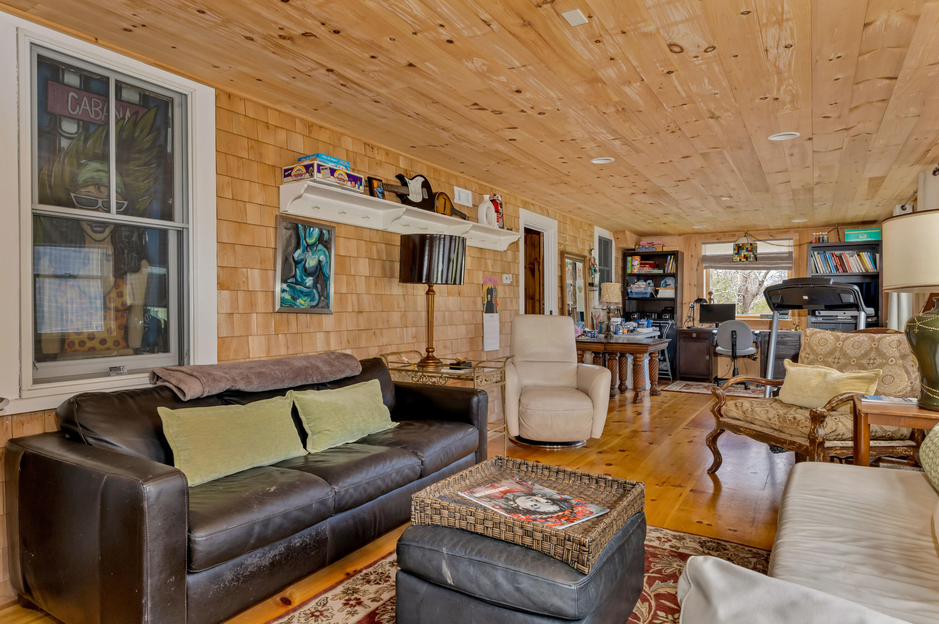 65 Depot Road Truro, MA 02666 - Photo 23 of 37 a living room with furniture and a large window