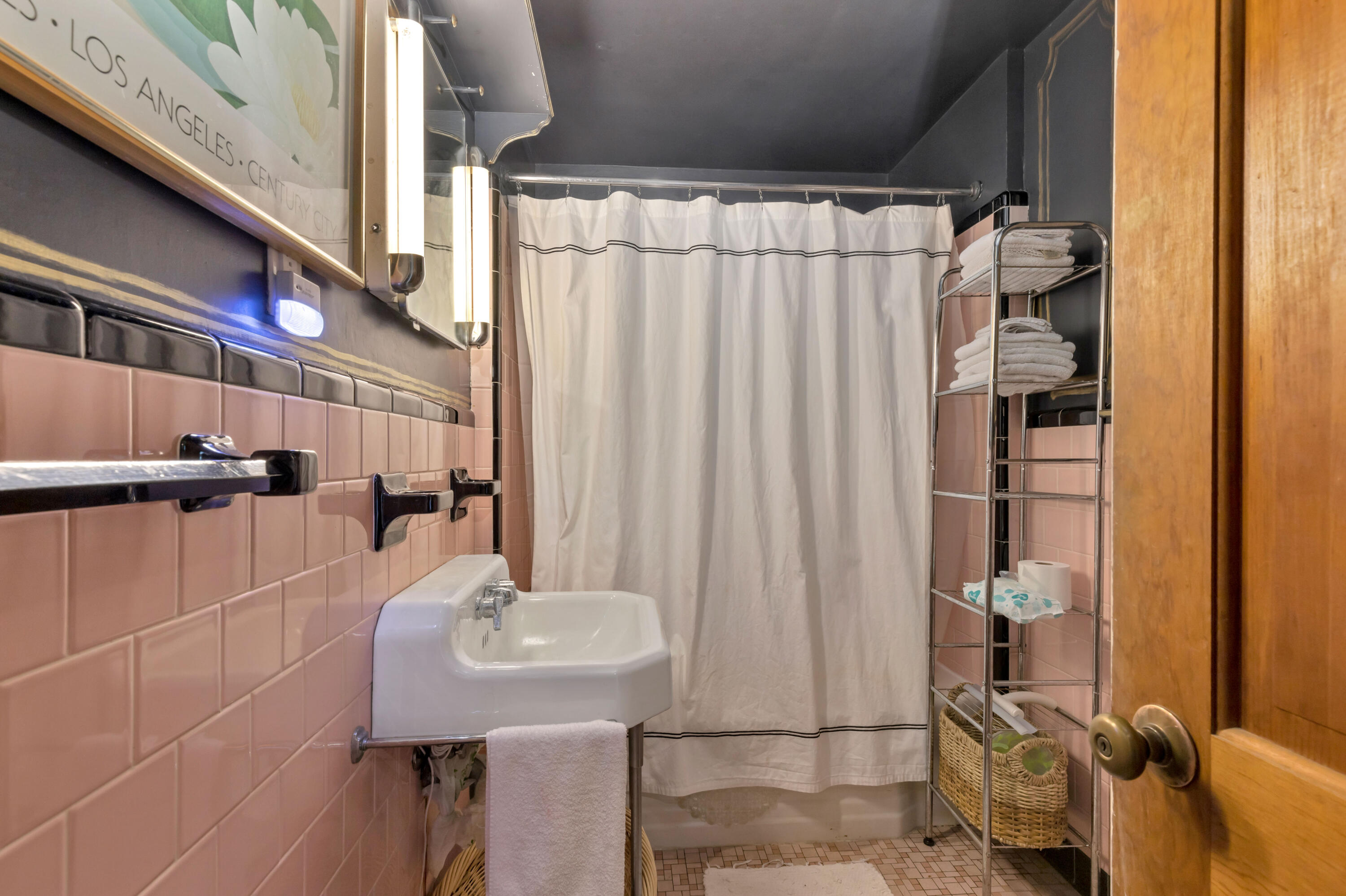 65 Depot Road Truro, MA 02666 - Photo 27 of 37 a bathroom with a sink and a mirror