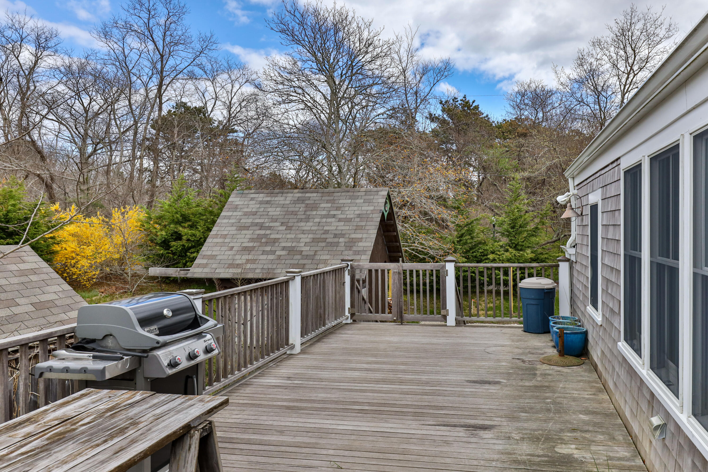65 Depot Road Truro, MA 02666 - Photo 31 of 37 a balcony with wooden floor and city view