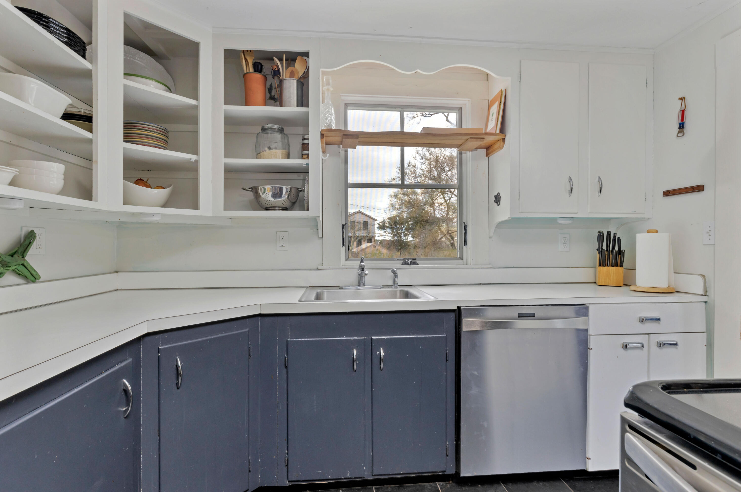 65 Depot Road Truro, MA 02666 - Photo 6 of 37 a kitchen with stainless steel appliances granite countertop a sink and a stove