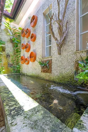 a bathroom with a toilet a sink and a mirror